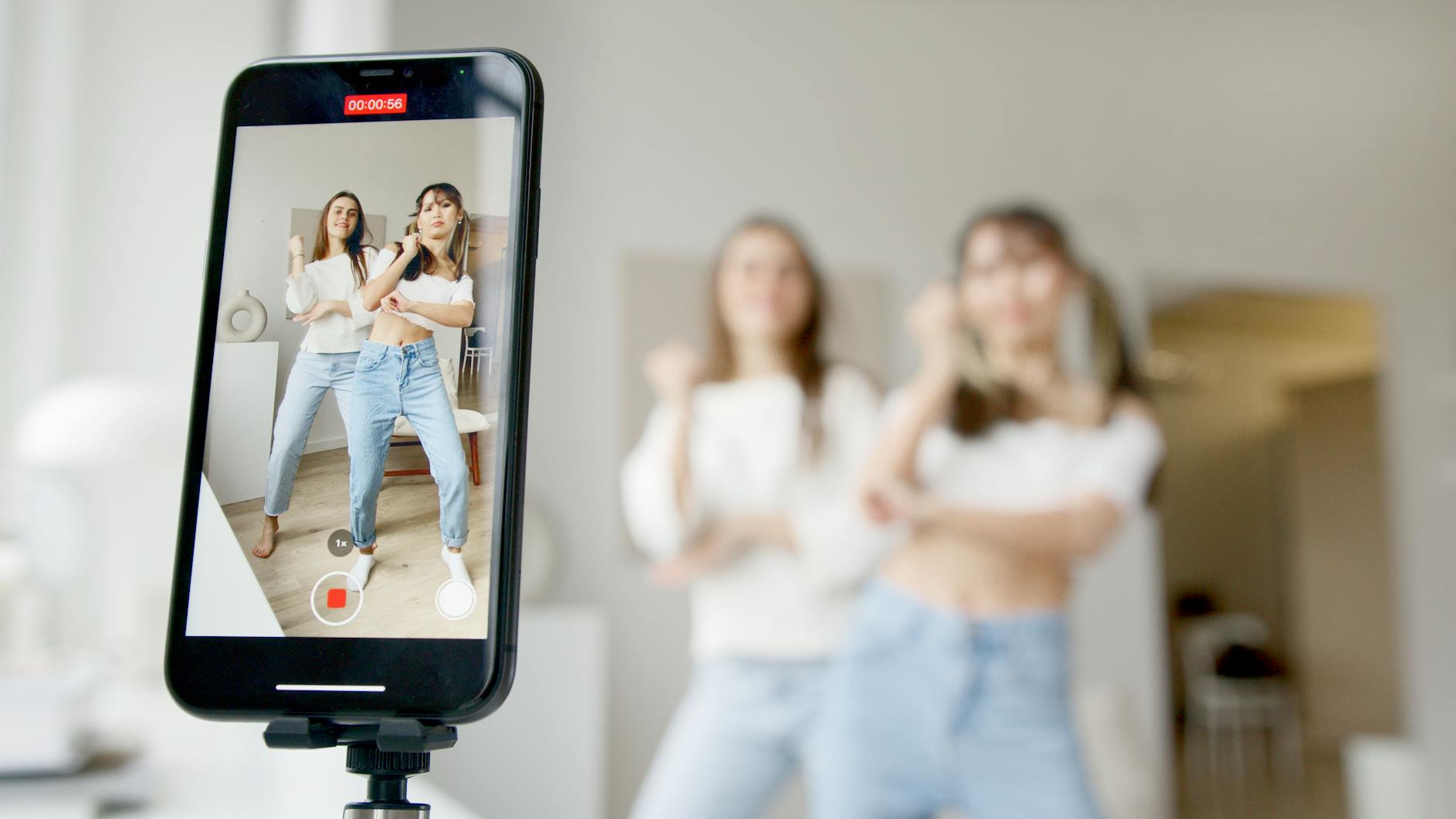 pexels-photo-6003271 women recording using a smartphone